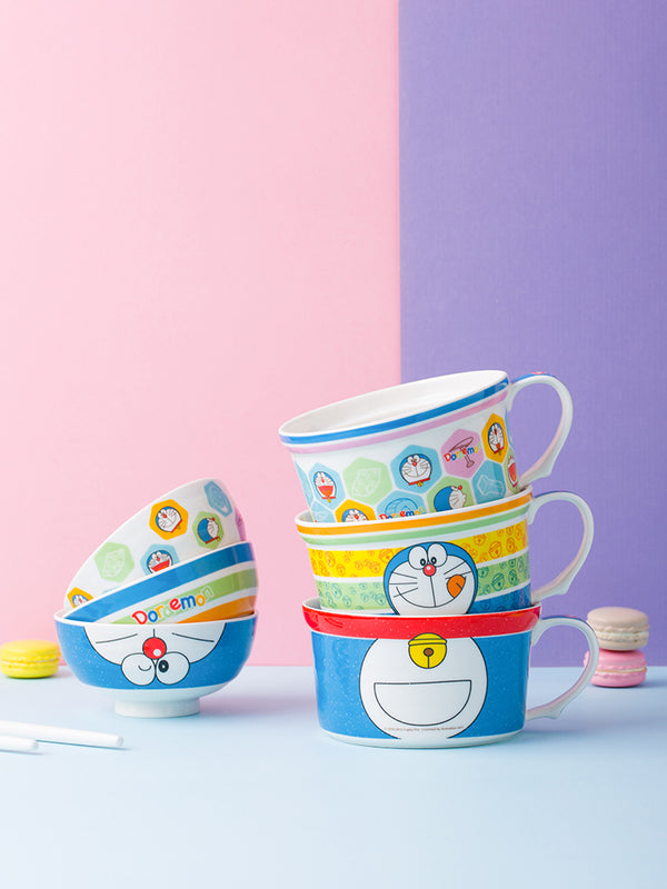 Various Doraemon Large Capacity Bowl With Lid designs stacked on each other