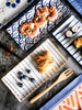 A variety of food on an assortment of Japanese Hand Painted Rectangular Plates